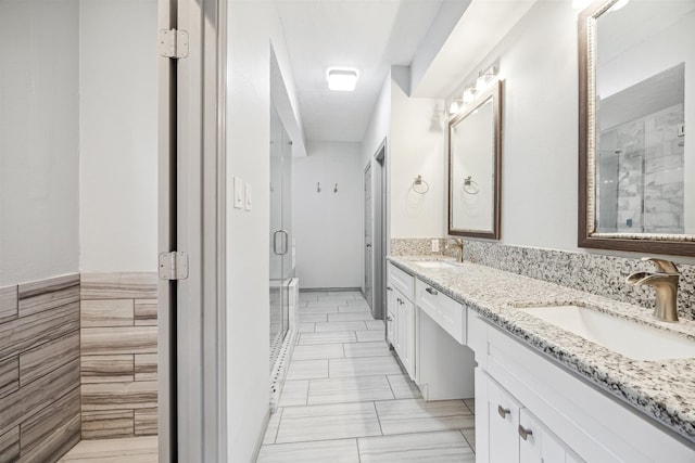 bathroom with vanity and walk in shower