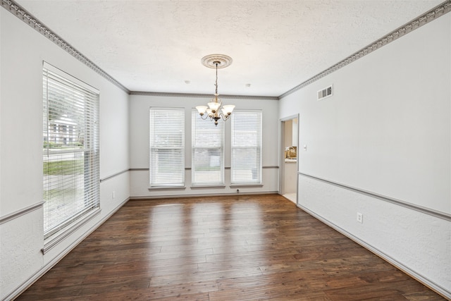 unfurnished dining area featuring a healthy amount of sunlight and dark hardwood / wood-style flooring