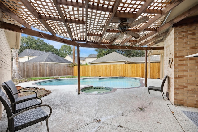 view of swimming pool featuring a pergola, a patio area, and an in ground hot tub