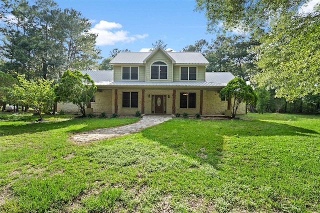 view of front facade with covered porch and a front lawn