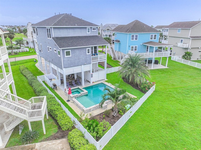 back of house with a residential view, a patio area, a fenced backyard, and stairway