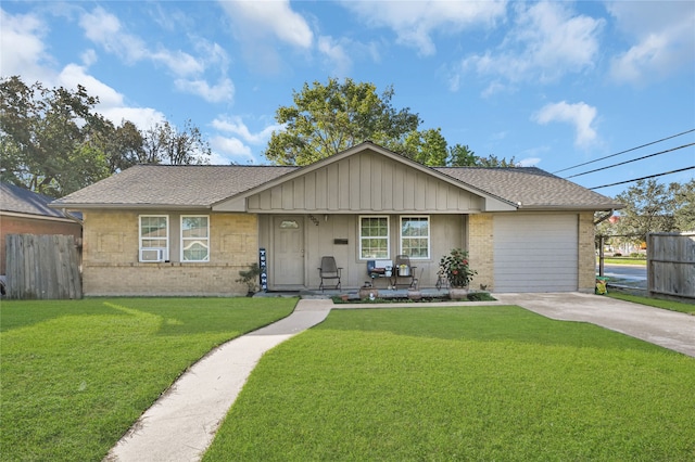 ranch-style home with a porch and a front lawn