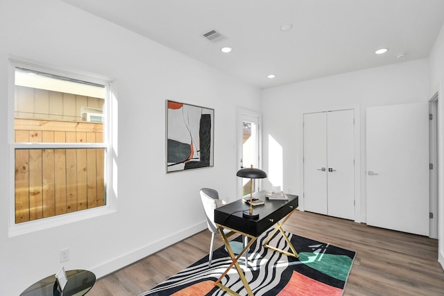 office area with wood-type flooring