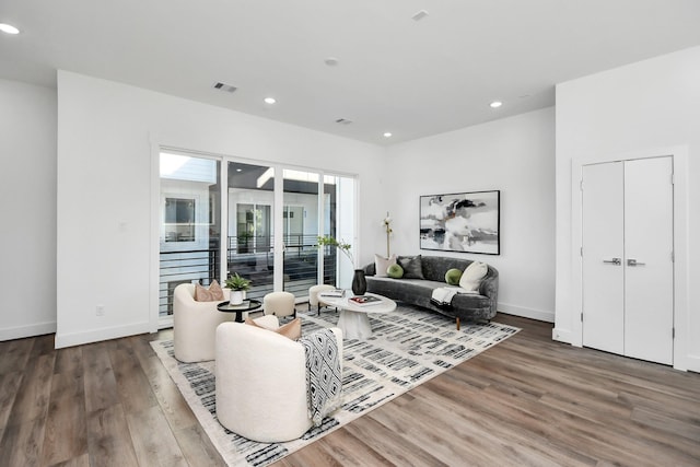 living room with dark wood-type flooring