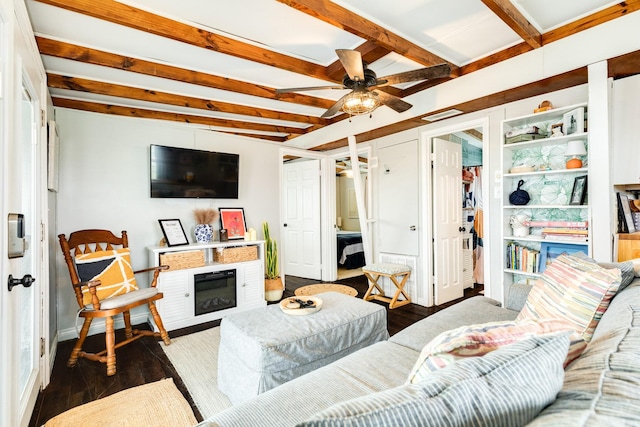 living room with beam ceiling, ceiling fan, and dark wood-type flooring