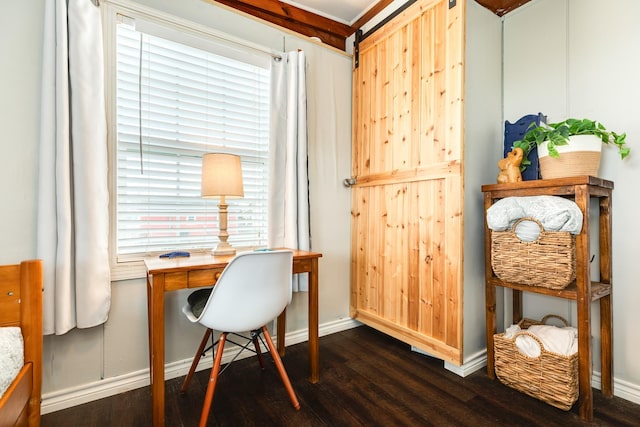 office area with dark hardwood / wood-style flooring and crown molding