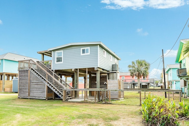 rear view of house with central AC