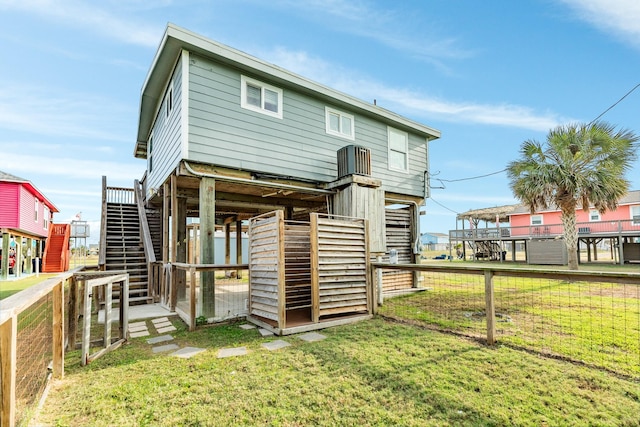 back of property featuring an outdoor structure