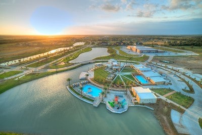 aerial view at dusk with a water view