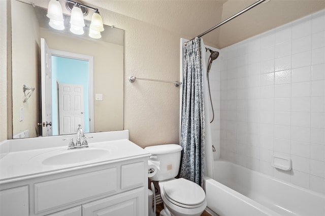 full bathroom featuring shower / bath combo, toilet, and vanity