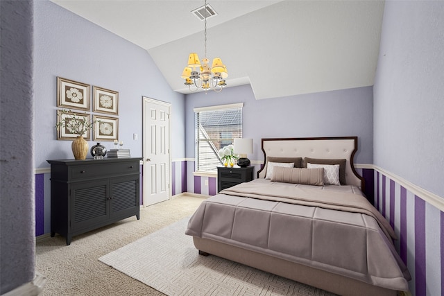 bedroom with light colored carpet, vaulted ceiling, and an inviting chandelier