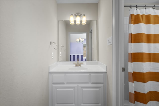 bathroom featuring vanity and walk in shower