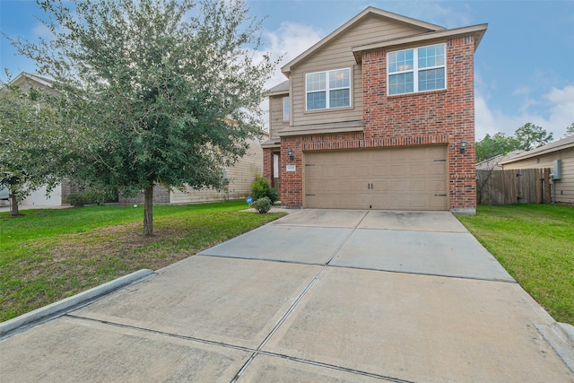 view of front of home with a front yard and a garage