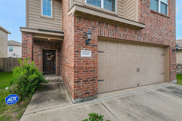 property entrance with a garage