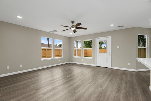 interior space featuring dark hardwood / wood-style floors and ceiling fan