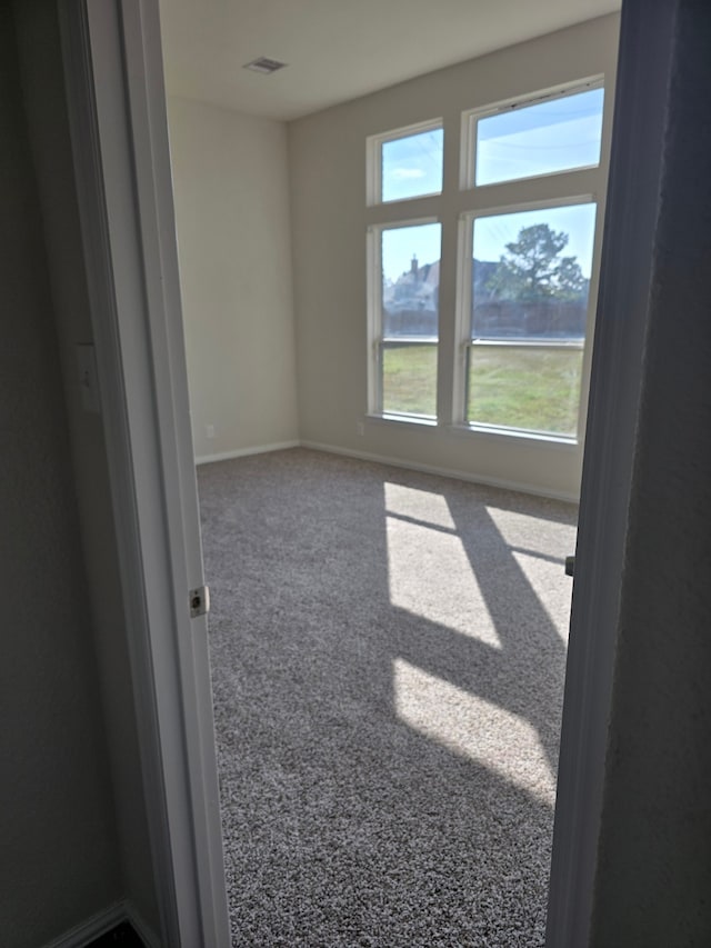 view of carpeted spare room