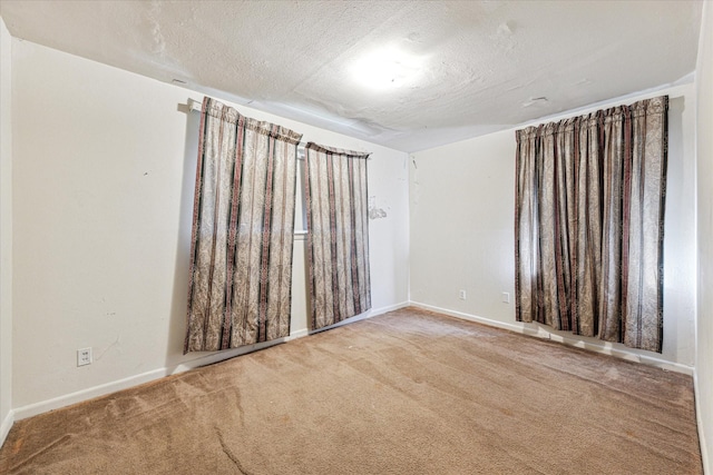 331 Surratt Dr, Houston, TX 77091 - carpeted spare room with baseboards and a textured ceiling