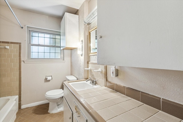 331 Surratt Dr, Houston, TX 77091 - full bath with vanity, toilet, tile patterned floors, and tub / shower combination