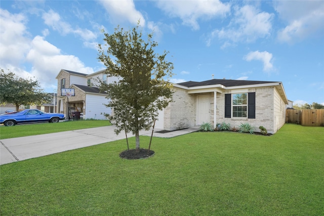 ranch-style home with a front yard