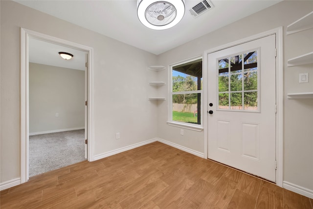 doorway featuring light hardwood / wood-style floors