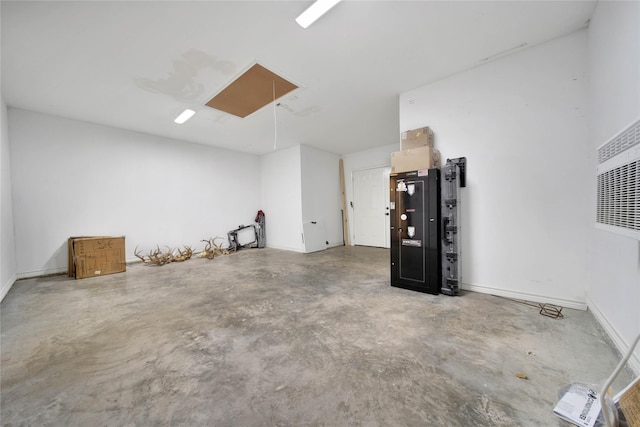 12466 Royal Lake Dr, Conroe, TX 77303 - garage featuring baseboards