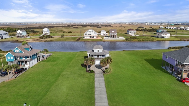 drone / aerial view with a water view