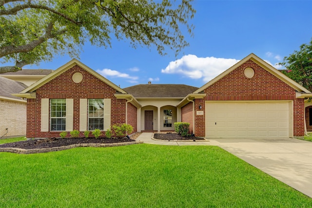 view of front facade featuring a front yard and a garage