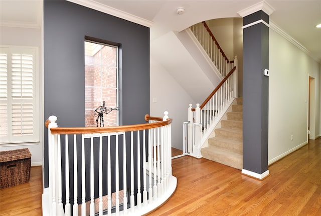 interior space with crown molding and hardwood / wood-style floors