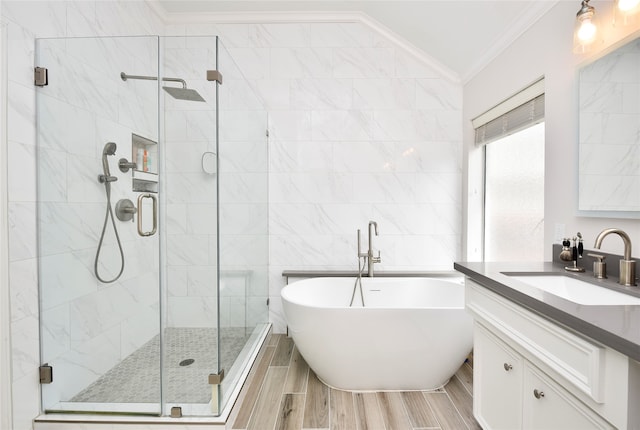 bathroom featuring vanity, independent shower and bath, and crown molding