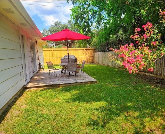 view of yard featuring a patio and a fenced backyard