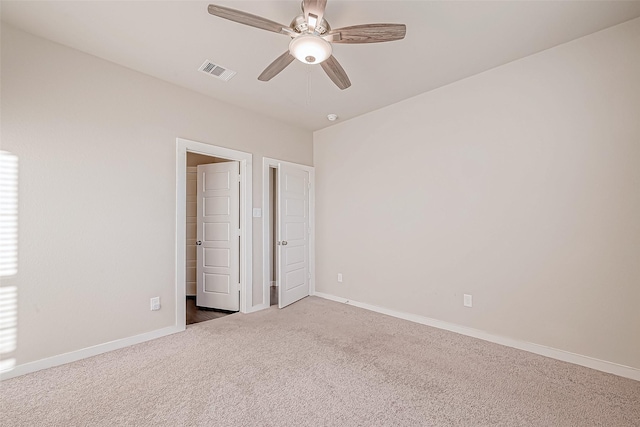 unfurnished bedroom with carpet flooring and ceiling fan