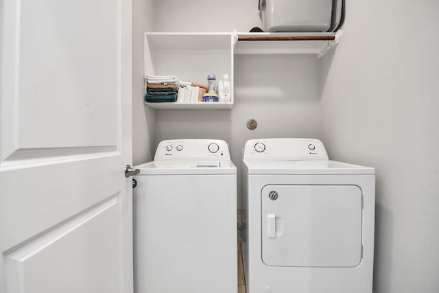 laundry room featuring washer and clothes dryer