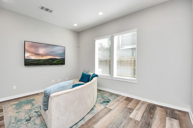 living area featuring hardwood / wood-style flooring