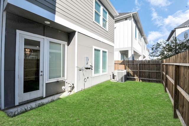 view of yard featuring central AC unit