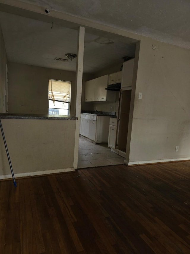 interior space with hardwood / wood-style floors