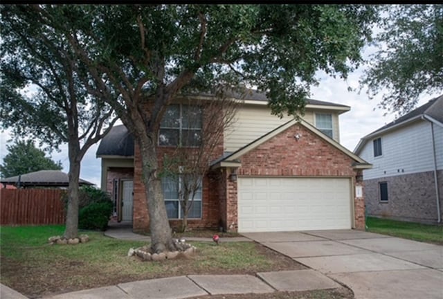 front of property with a garage