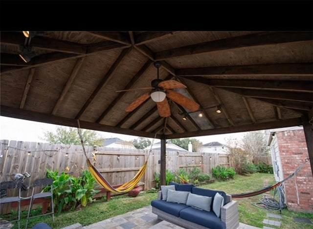 view of patio with a gazebo and ceiling fan