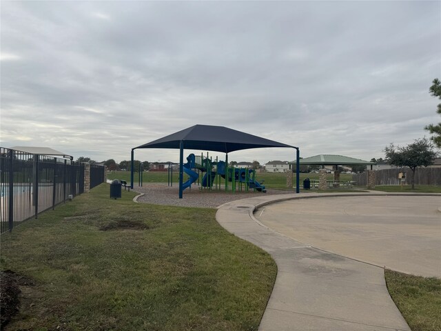 view of playground with a yard