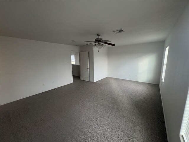 empty room featuring ceiling fan