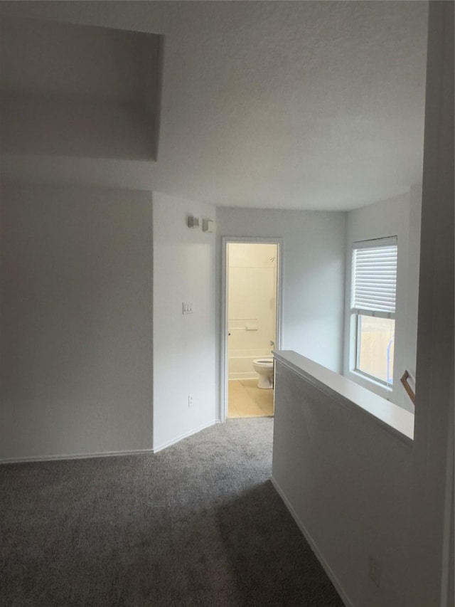 empty room with carpet floors