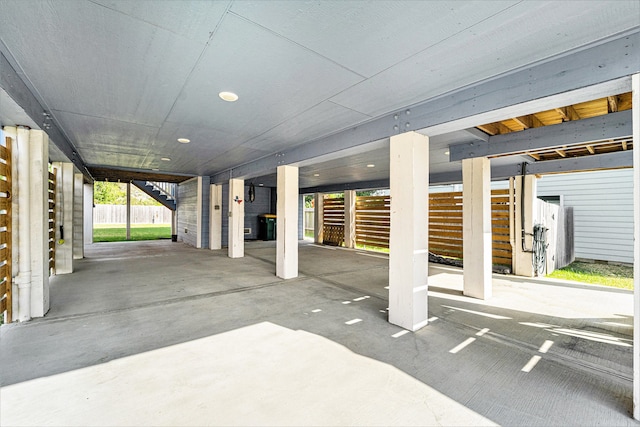 garage featuring a carport