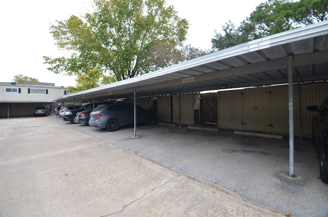 view of parking with a carport