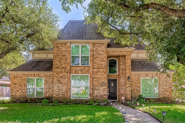 view of property with a front yard