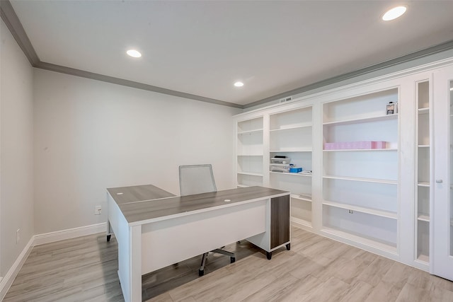 office space with crown molding and light hardwood / wood-style flooring