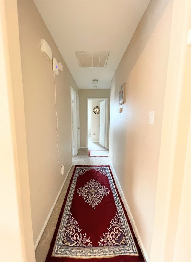 corridor with carpet floors