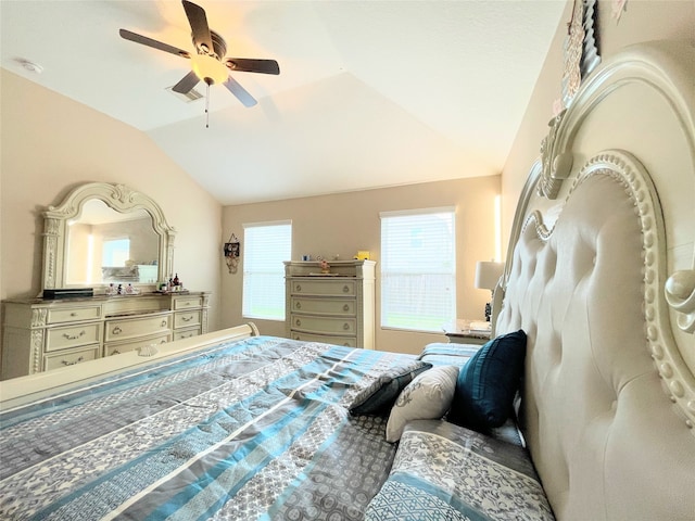 bedroom with ceiling fan and vaulted ceiling