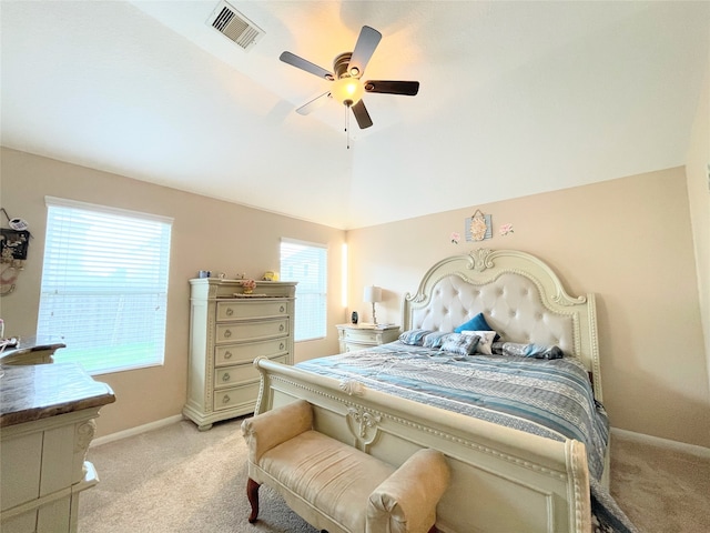 bedroom featuring ceiling fan and light carpet