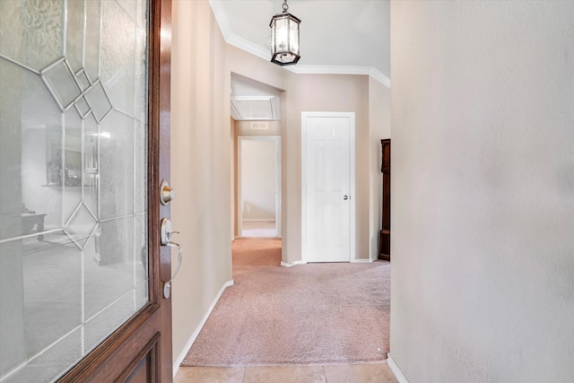 hallway with light carpet and crown molding