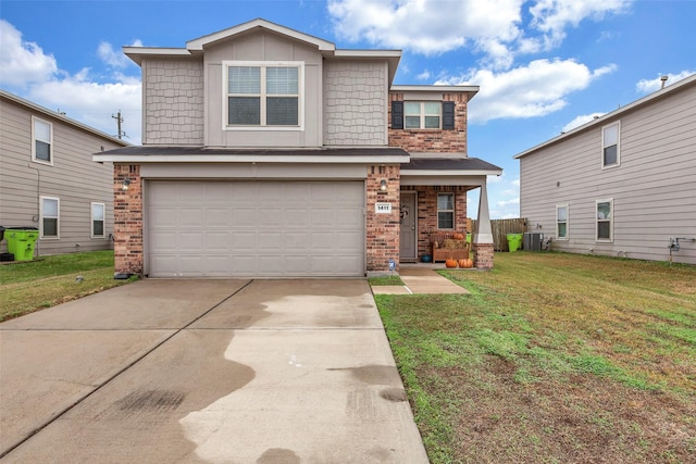 view of front of property featuring central AC unit, a garage, and a front yard