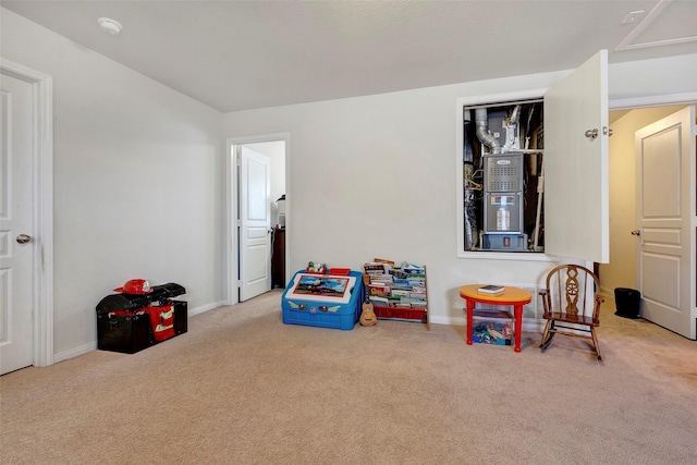 game room with light colored carpet